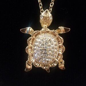 Gold toned sparkly turtle pendant necklace